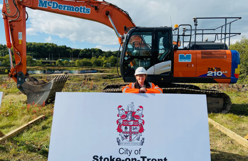 Abi Brown in front of a digger