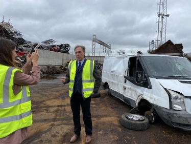 Cllr Carl Edwards being interviewed in front of the flytipper’s van