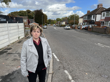 Abi Brown on Caverswall Lane, where she is keen to secure double yellow lines.